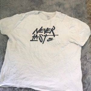 White Nike shirt with black writing